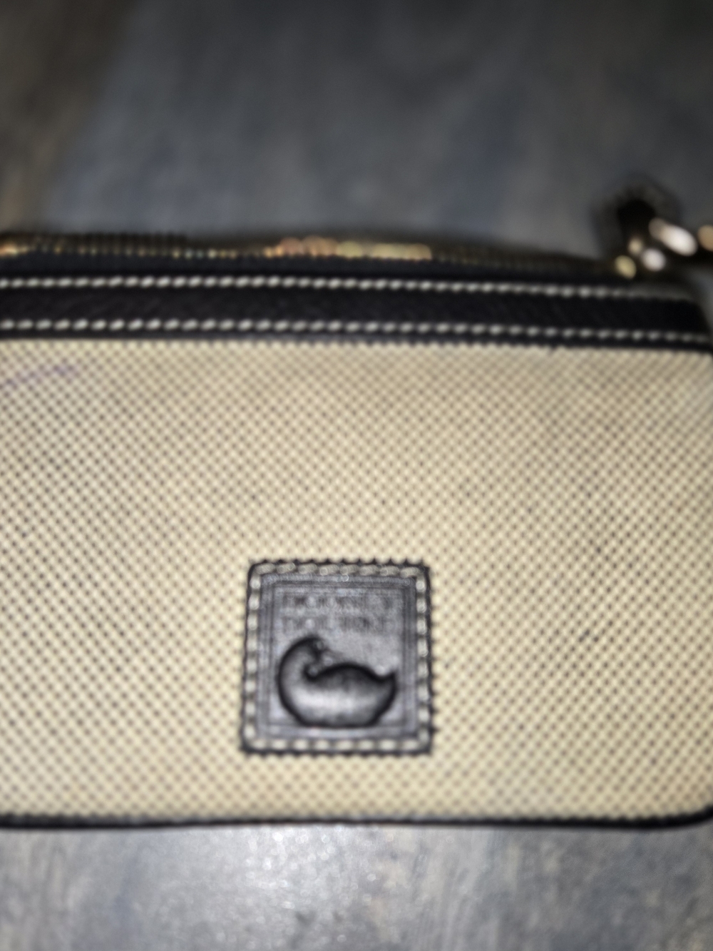 Dooney & Bourke Beige Canvas and Black Leather Zip Wallet